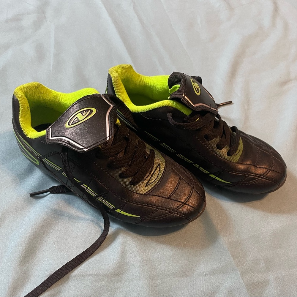 Black and Green kids soccer cleats